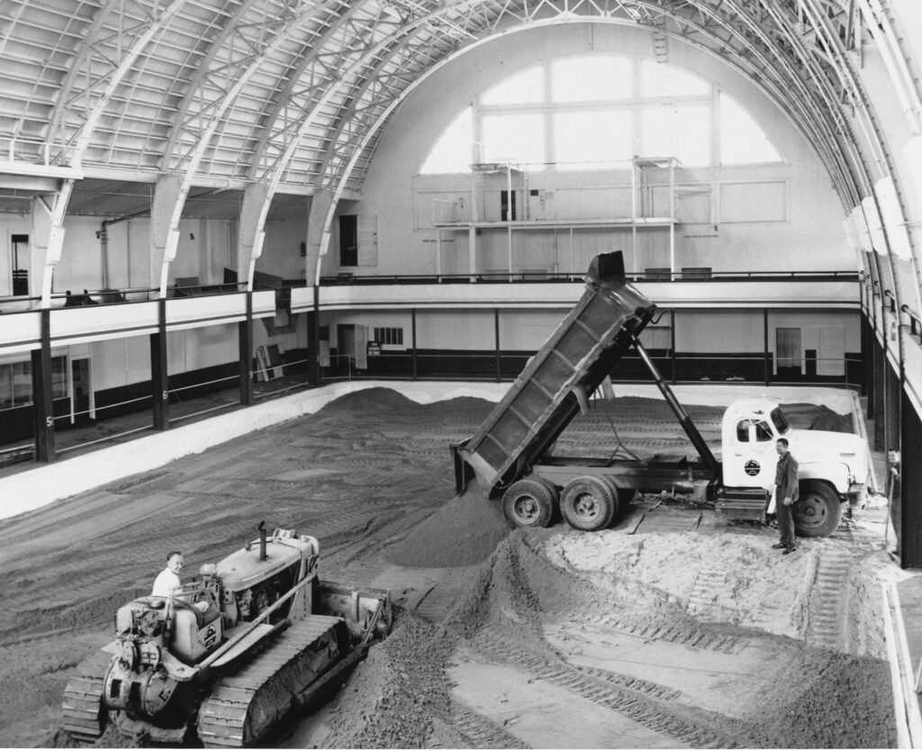 Filling in the pool with sand, 1963.