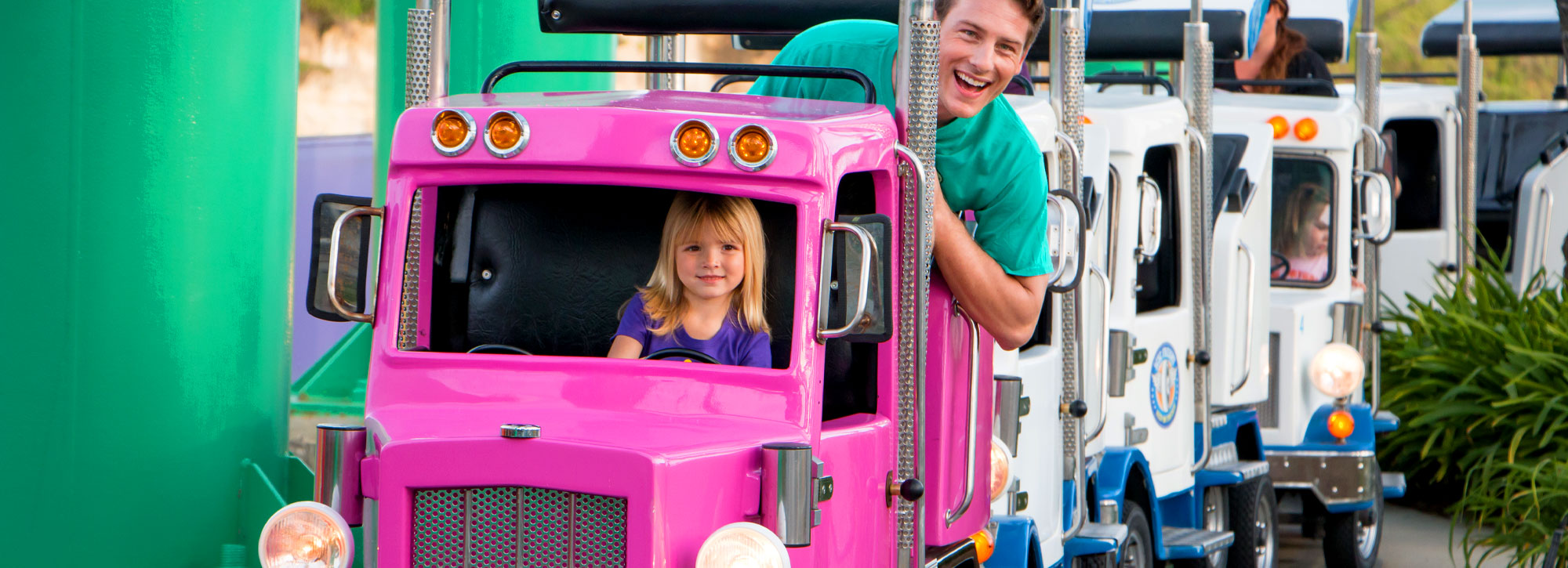 child riding a truck ride